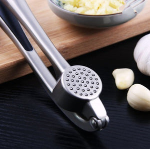 The Essential Kitchen Gadget: Manual Garlic Press Mashing Tool